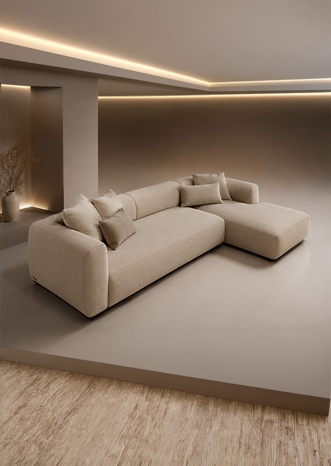Modern cream sectional sofa in minimalist interior, Realistic 3D